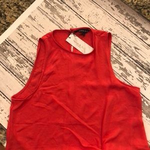 Asymmetric sleeveless red top